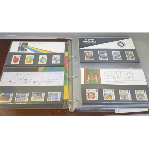 653 - An album of Royal Mail mint stamps, forty three packs plus loose stamps