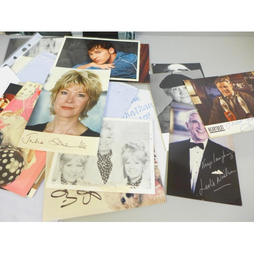 656 - Show business autographs including Tom Selleck, Leslie Nielsen, Status Quo, Tiswas team, Paul Whiteh... 