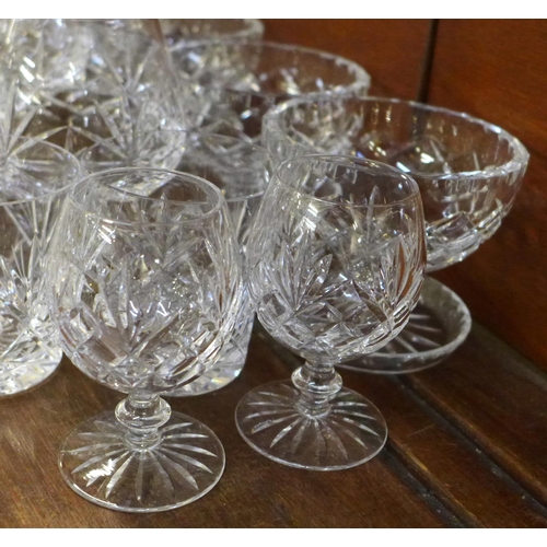 662 - A collection of crystal - two brandy balloons, six medium tumblers, two small tumblers, five sherry ... 