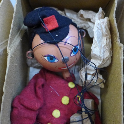 687 - Two Pelham puppets, boxed