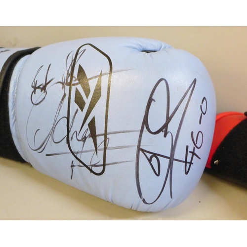 695 - Two signed boxing gloves, one signed Ricky Hatton, and a Frank Bruno programme