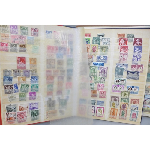 697 - Two stock books of world stamps