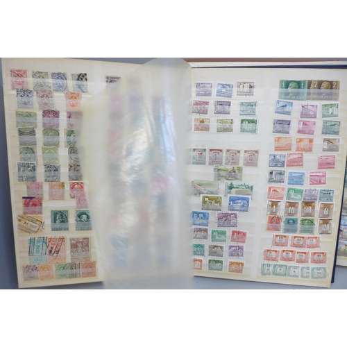 697 - Two stock books of world stamps