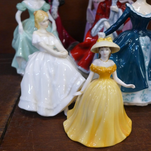 698 - Eleven figures including Coalport Henrietta, Stunning in Black, Debutante Abbie, Royal Worcester Ale... 