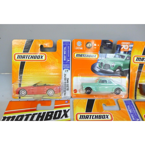 699 - Twelve Matchbox model vehicles including eight MBX-Metal Series, in bubble packs