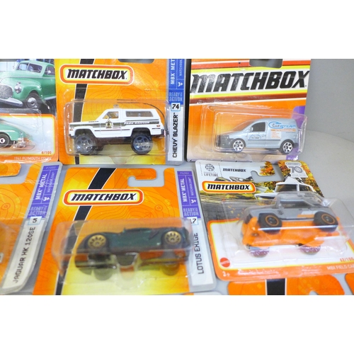 699 - Twelve Matchbox model vehicles including eight MBX-Metal Series, in bubble packs