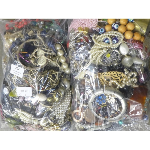 702 - Two bags of costume jewellery