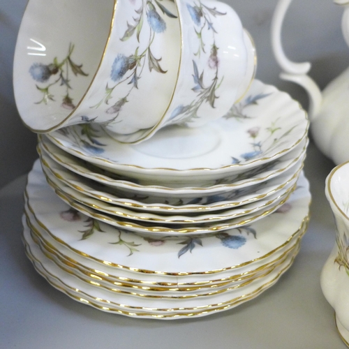 706 - A Royal Albert Brigadoon tea set with tea and coffee pot, also some Old Country Roses decorative pie... 