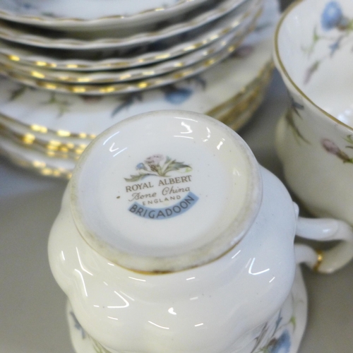 706 - A Royal Albert Brigadoon tea set with tea and coffee pot, also some Old Country Roses decorative pie... 