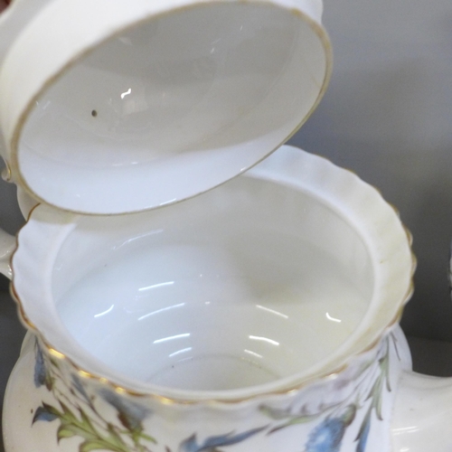 706 - A Royal Albert Brigadoon tea set with tea and coffee pot, also some Old Country Roses decorative pie... 