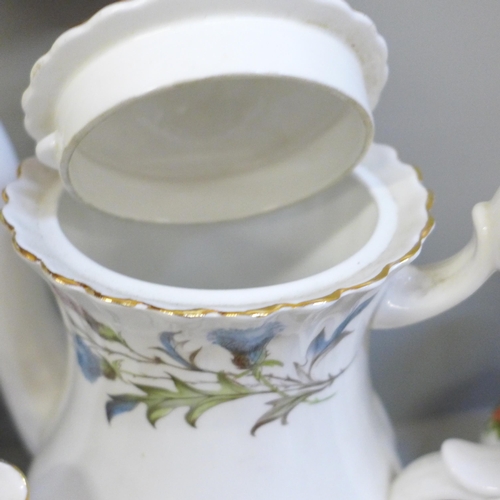 706 - A Royal Albert Brigadoon tea set with tea and coffee pot, also some Old Country Roses decorative pie... 