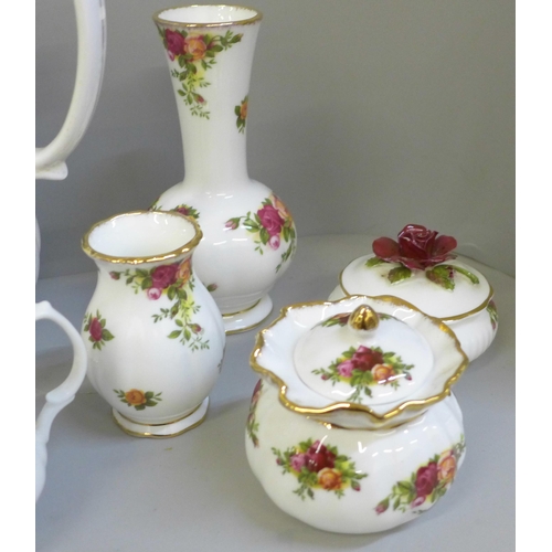 706 - A Royal Albert Brigadoon tea set with tea and coffee pot, also some Old Country Roses decorative pie... 