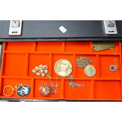 707 - A travel jewellery case and jewellery