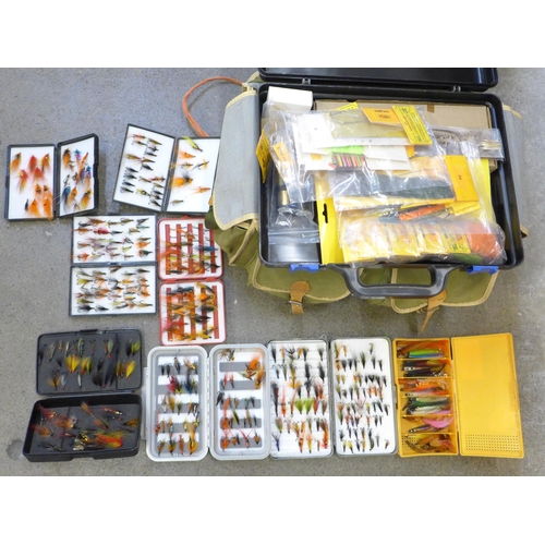 715 - A Lureflash fly tying kit and eight boxes of fishing flies in a fishing tackle bag