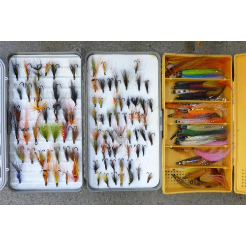 715 - A Lureflash fly tying kit and eight boxes of fishing flies in a fishing tackle bag