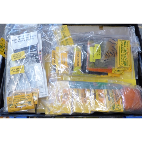 715 - A Lureflash fly tying kit and eight boxes of fishing flies in a fishing tackle bag