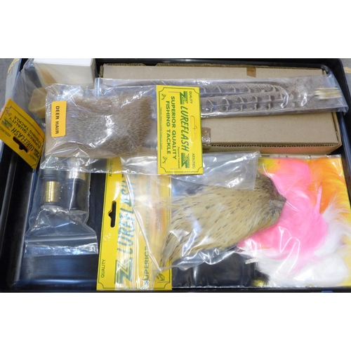 715 - A Lureflash fly tying kit and eight boxes of fishing flies in a fishing tackle bag