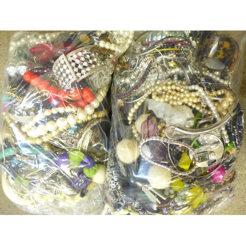 718 - Two bags of costume jewellery