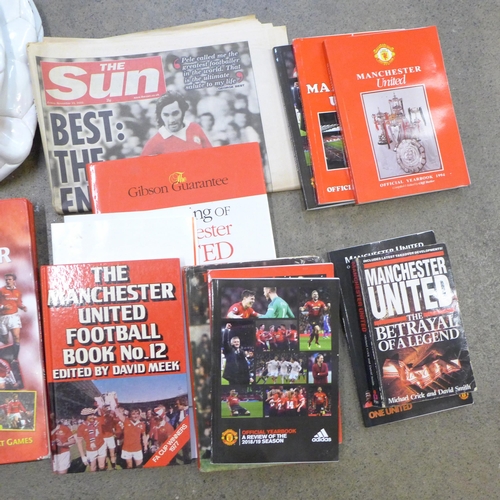 726 - Manchester United memorabilia, 1970s onwards, hardback books, programmes, fanzines, menus and two fo... 