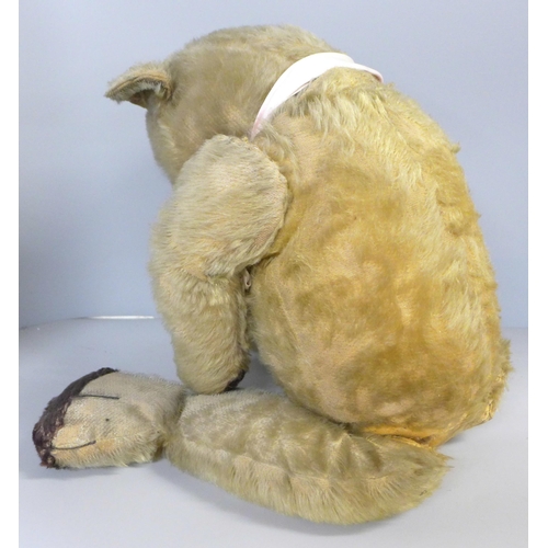 730 - A large vintage Teddy Bear with jointed limbs