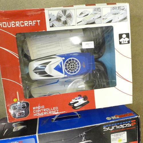 733 - A Maplin radio controlled model hovercraft and Kimax helicopter, boxed