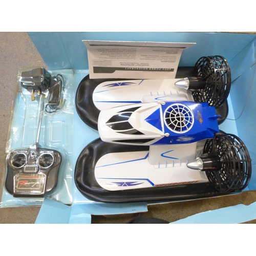 733 - A Maplin radio controlled model hovercraft and Kimax helicopter, boxed