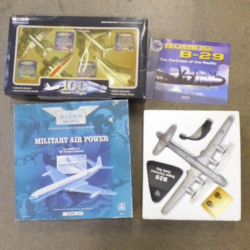 734 - A Corgi 100 Years of Flight set, a Corgi Aviation Archive Military Air Power and an Atlas Editions B... 