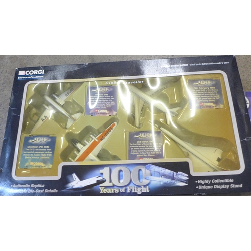 734 - A Corgi 100 Years of Flight set, a Corgi Aviation Archive Military Air Power and an Atlas Editions B... 