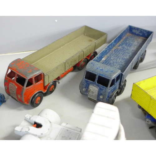 748 - A collection of playworn Dinky Supertoys including Foden, 20 Ton Crane Mercedes Benz LP 1920