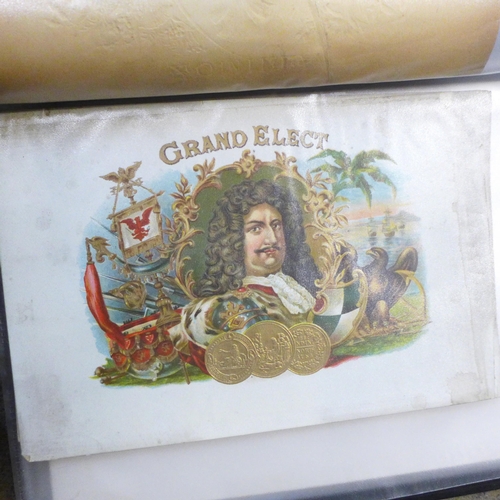 749 - Two albums of cigar bands and one album of cigar labels, mostly early 20th century (3)