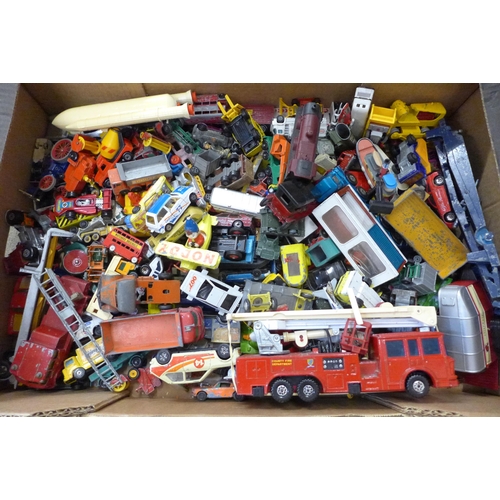 753 - A collection of Matchbox and Corgi die-cast model vehicles, etc., playworn