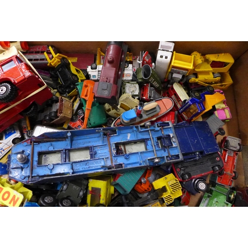 753 - A collection of Matchbox and Corgi die-cast model vehicles, etc., playworn