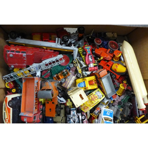 753 - A collection of Matchbox and Corgi die-cast model vehicles, etc., playworn