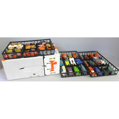 760 - Thirty six playworn Matchbox model vehicles in a carry case, lacking handle