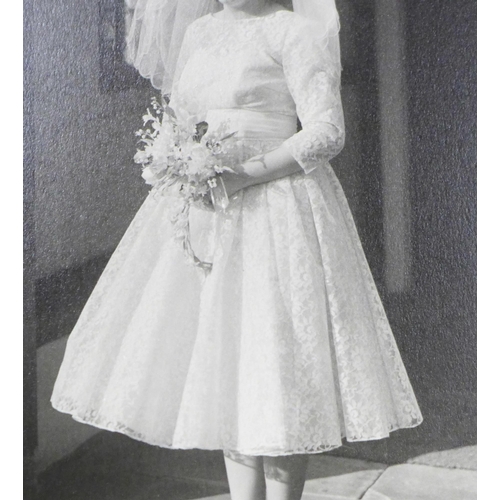 765 - A lace wedding dress, with photograph of it worn at a Wedding ceremony in 1961 by the vendors mother... 