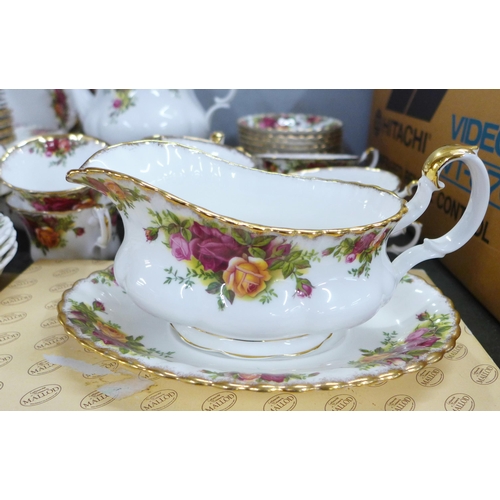 776A - A collection of Royal Albert Old Country Roses, six setting tea and dinner service, includes cake st... 