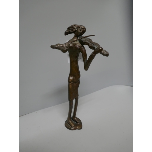 777 - A bronze figure of a female violinist, 25.5cm