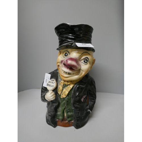 791 - A Staffordshire Toby jug, 'I am on the Blacklist', hat repaired, c1906 and a large jelly or blancman... 