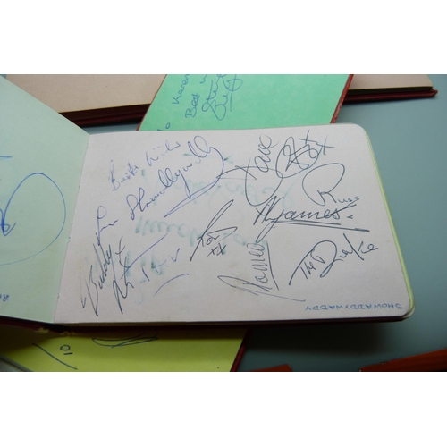 824 - An autograph album, includes Tommy Cooper, Yootha Joyce, Joe Brown, Val Doonican, etc., two other al... 