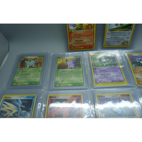 831 - Twelve vintage Pokemon cards including two World Championships 2005 (Nidoran and Nidorina), Gym Hero... 