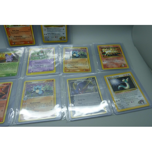 831 - Twelve vintage Pokemon cards including two World Championships 2005 (Nidoran and Nidorina), Gym Hero... 