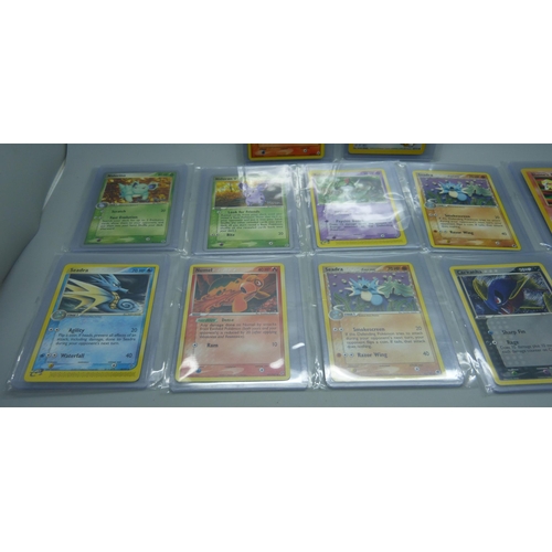 831 - Twelve vintage Pokemon cards including two World Championships 2005 (Nidoran and Nidorina), Gym Hero... 