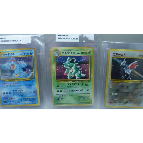 833 - Three vintage Japanese holographic cards - Neo Genesis Feraligatr, Neo Genesis Skarmory and Nidoquee... 