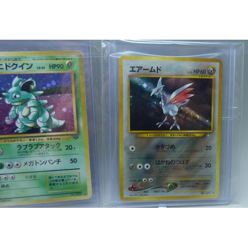 833 - Three vintage Japanese holographic cards - Neo Genesis Feraligatr, Neo Genesis Skarmory and Nidoquee... 