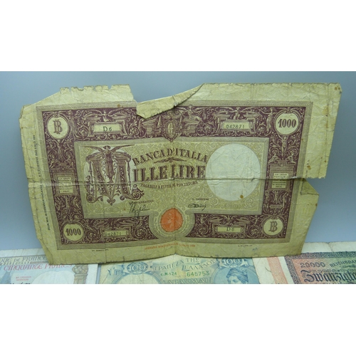 841 - A collection of foreign banknotes including a North Korea 100 Won note