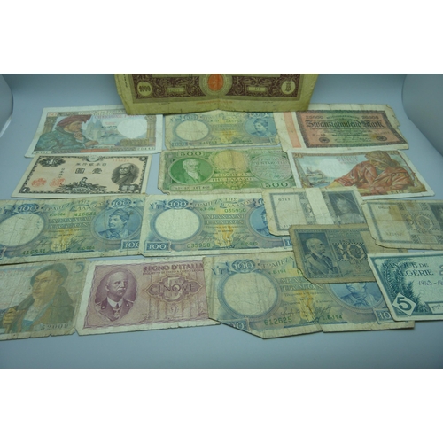 841 - A collection of foreign banknotes including a North Korea 100 Won note