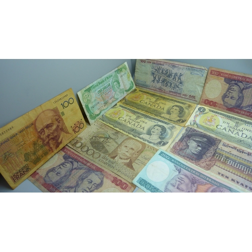 845 - A collection of fifty vintage bank notes, US dollars, South Arabian, Australia, etc.