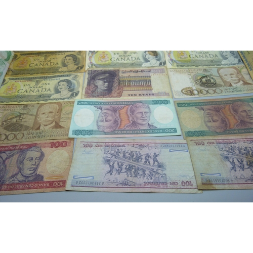 845 - A collection of fifty vintage bank notes, US dollars, South Arabian, Australia, etc.