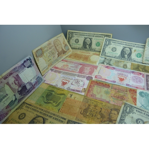 845 - A collection of fifty vintage bank notes, US dollars, South Arabian, Australia, etc.