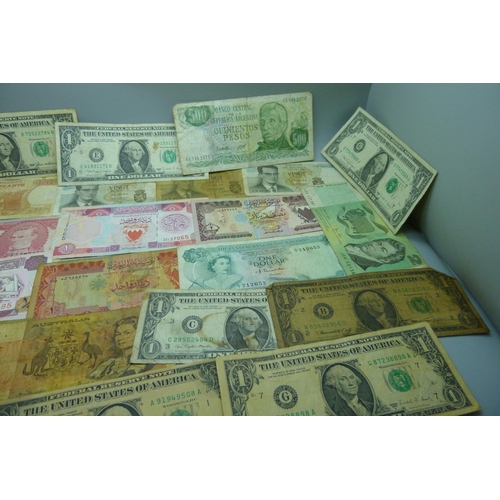 845 - A collection of fifty vintage bank notes, US dollars, South Arabian, Australia, etc.